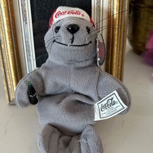 Vintage Coca-Cola seal bean bag plush toy from 1997.